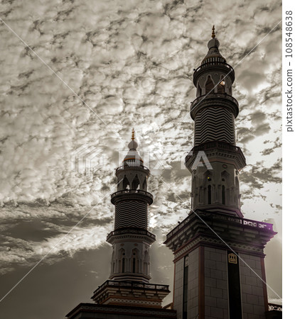 Architecture Two towers design of Masjid Al - Yusraw or Al - Yusraw Mosque with sky background. 108548638