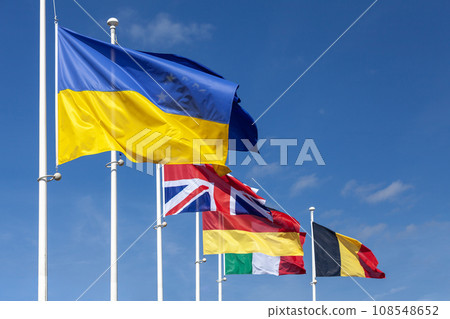 European flags waving atop of their poles European flags waving atop of their poles 108548652