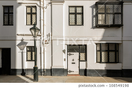 Facade of a house in De Vere Cottages and street light at South Kensington Facade of a house in De Vere Cottages and street light at South Kensington 108549198
