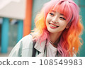 a woman with bright pink hair smiling 108549983