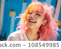 a woman with bright pink hair smiling 108549985