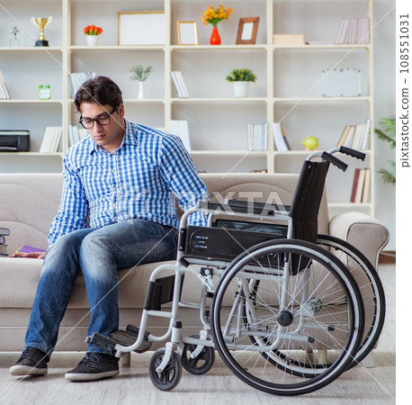 Young student on wheelchair in disability concept 108551031