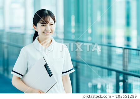 A young female medical worker. 108551289