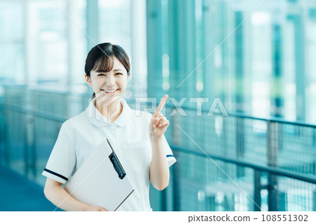 A young female medical worker. A young female medical worker. 108551302