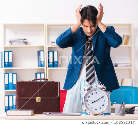Employee coming to work straight from bed Employee coming to work straight from bed 108551317