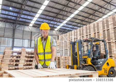 Man engineer carpenter wearing safety uniform and hard hat working checking quality Man engineer carpenter wearing safety uniform and hard hat working checking quality 108553386