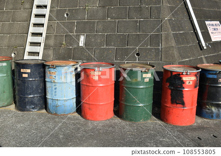 Drums used as waste storage containers Drums used as waste storage containers 108553805