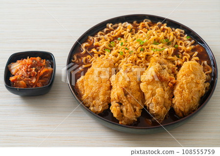Korean instant noodles with fried chicken or Fried chicken ramyeon 108555759