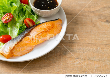 grilled salmon fillet steak with salad grilled salmon fillet steak with salad 108555774