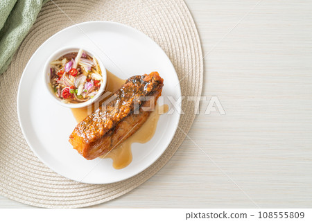 fried snapper fish with fish sauce and spicy salad fried snapper fish with fish sauce and spicy salad 108555809