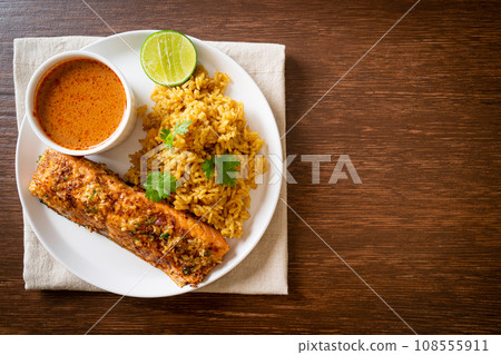 masala rice with salmon tandoori 108555911