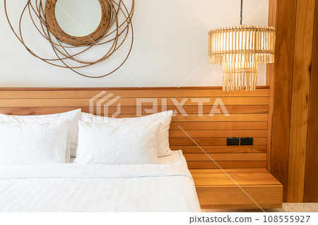 white pillow decoration on bed in bedroom white pillow decoration on bed in bedroom 108555927