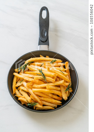 French fries with sour cream and ketchup French fries with sour cream and ketchup 108556042