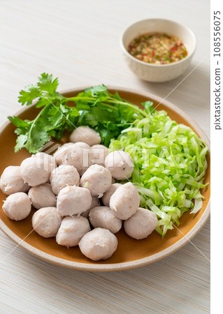 pork meatball with vegetable and spicy sauce pork meatball with vegetable and spicy sauce 108556075