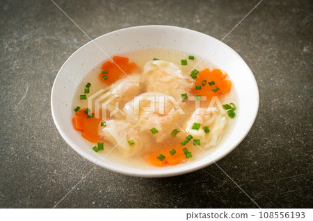 shrimp dumpling soup in white bowl 108556193