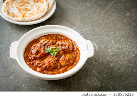 chicken tikka masala spicy curry meat food with roti or naan bread chicken tikka masala spicy curry meat food with roti or naan bread 108556226