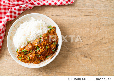 chicken tikka masala with rice on plate chicken tikka masala with rice on plate 108556232