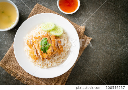 Steamed Rice with Fried Chicken or Hainanese Chicken Rice 108556237