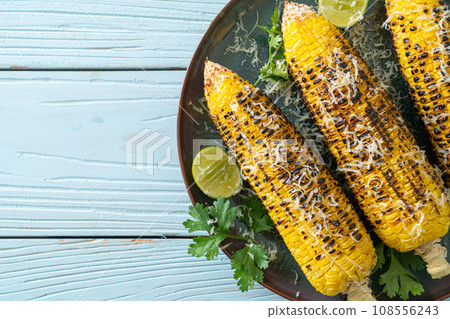 barbecue and grilled corn with cheese and lime barbecue and grilled corn with cheese and lime 108556243