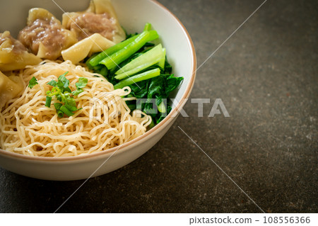 dried egg noodles with pork wonton or pork dumplings without soup 108556366