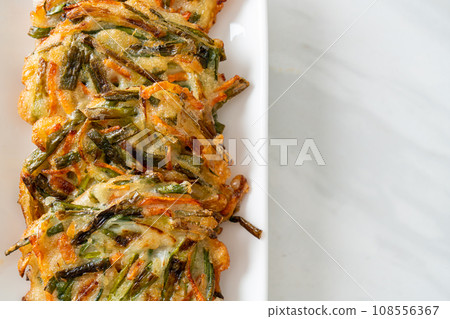 Pajeon or Korean pancake or Korean pizza Pajeon or Korean pancake or Korean pizza 108556367