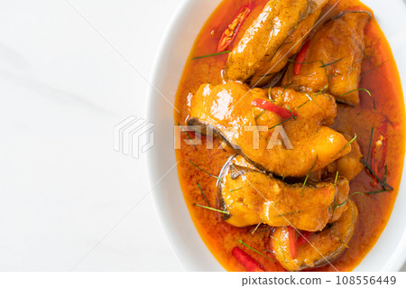 Redtail Catfish Fish in Dried Red Curry Sauce that called Choo Chee Redtail Catfish Fish in Dried Red Curry Sauce that called Choo Chee 108556449