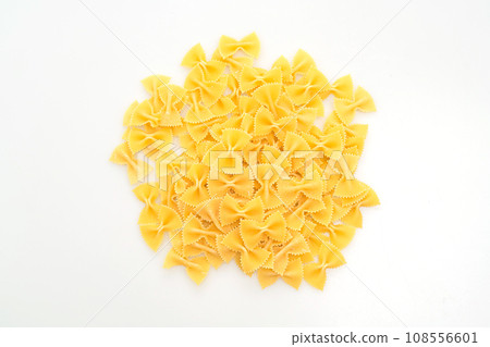 Dry uncooked farfalle pasta on white background 108556601