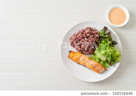 grilled salmon fillet steak with rice berry and vegetable 108556846