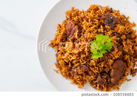 Nasi goreng - fried rice with pork in Indonesia style Nasi goreng - fried rice with pork in Indonesia style 108556883