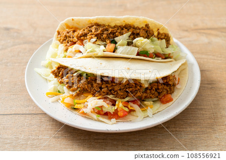 Mexican tacos with minced chicken 108556921