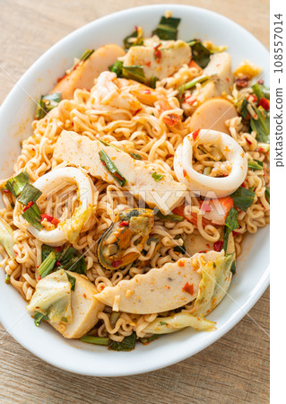 Instant noodle spicy salad with mixed meats Instant noodle spicy salad with mixed meats 108557014