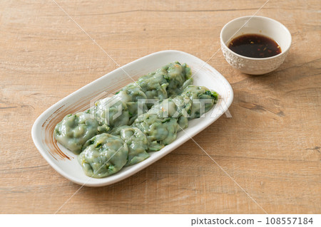 steamed chives dumplings with sauce steamed chives dumplings with sauce 108557184