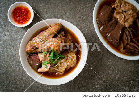 Braised duck noodles with brown soup 108557185
