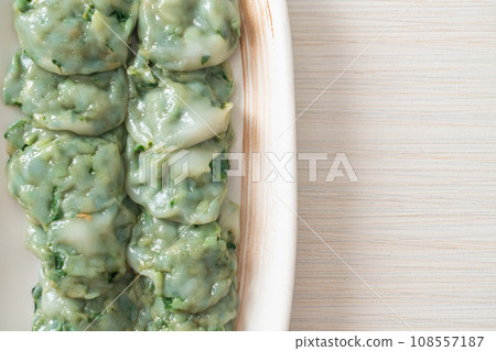 steamed chives dumplings with sauce steamed chives dumplings with sauce 108557187