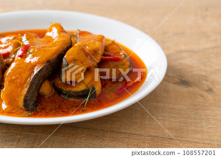 Redtail Catfish Fish in Dried Red Curry Sauce that called Choo Chee Redtail Catfish Fish in Dried Red Curry Sauce that called Choo Chee 108557201