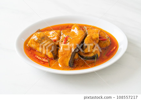 Redtail Catfish Fish in Dried Red Curry Sauce that called Choo Chee Redtail Catfish Fish in Dried Red Curry Sauce that called Choo Chee 108557217