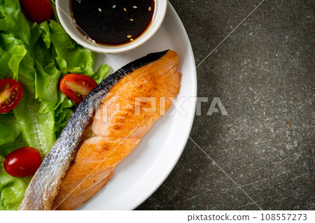 grilled salmon fillet steak with salad grilled salmon fillet steak with salad 108557273