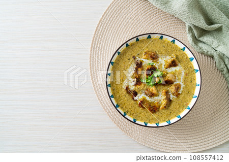 Afghani chicken in green masala curry or Hariyali tikka chicken hara masala Afghani chicken in green masala curry or Hariyali tikka chicken hara masala 108557412