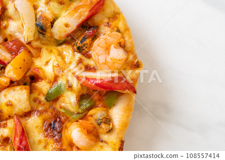 seafood pizza on wood tray seafood pizza on wood tray 108557414