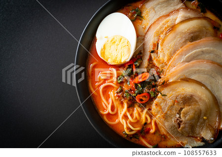Ramen Noodles Spicy Tomyum Soup with Roast Pork Ramen Noodles Spicy Tomyum Soup with Roast Pork 108557633