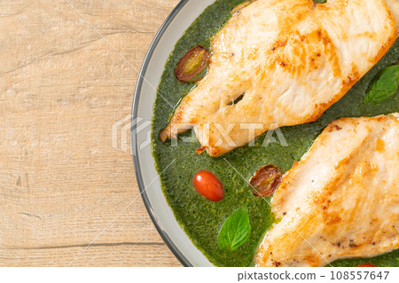 grilled chicken steak with pesto sauce grilled chicken steak with pesto sauce 108557647