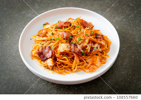 stir-fried spaghetti with kimchi and bacon stir-fried spaghetti with kimchi and bacon 108557660