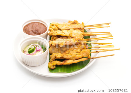 Pork satay - Grilled pork served with peanut sauce or sweet and sour sauce 108557681