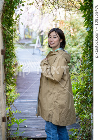 A woman strolling through the townscape A woman strolling through the townscape 108558476