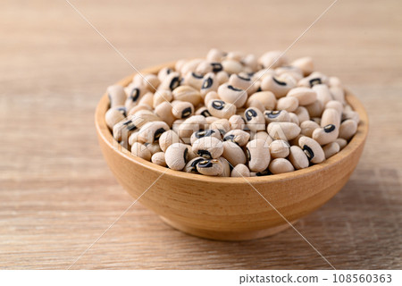 Black eye peas or cowpeas in bowl on wooden background, Food ingredients 108560363