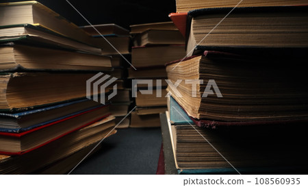 Library stack of old books, background of rows in antique shop, bookstore. Library stack of old books, background of rows in antique shop, bookstore. 108560935