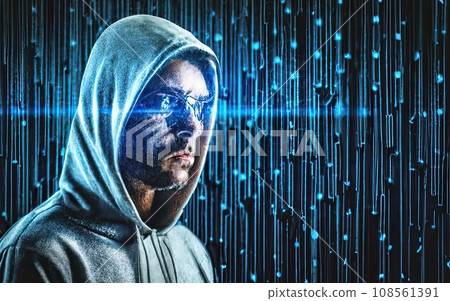 Hacker in hoodie in dark background 108561391