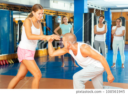 Young woman doing wristlock 108561945