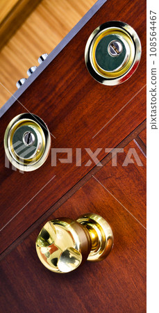 Modern wooden looking steel door, security lock system 108564467