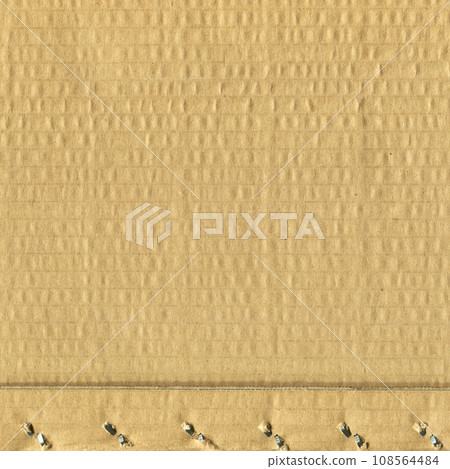 Brown and beige colored corrugated cardboard detail Brown and beige colored corrugated cardboard detail 108564484